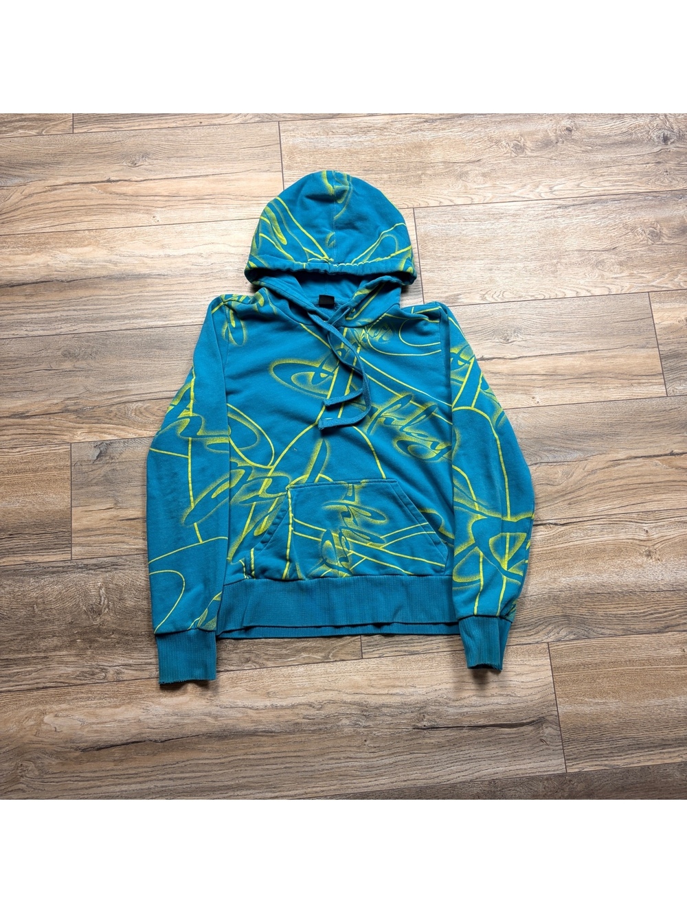Oakley AOP hoodie, good colors small hole, size Small 18x21